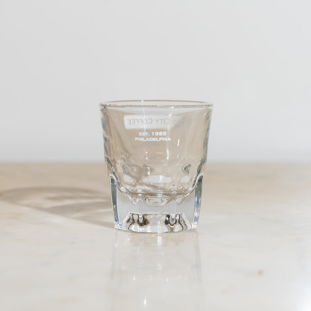 Side view of the Gibraltar glass showing the white Old City Coffee Est. 1985 Philadelphia logo near the rim