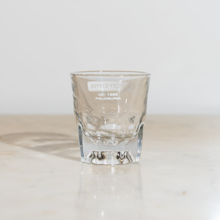 Side view of the Gibraltar glass showing the white Old City Coffee Est. 1985 Philadelphia logo near the rim