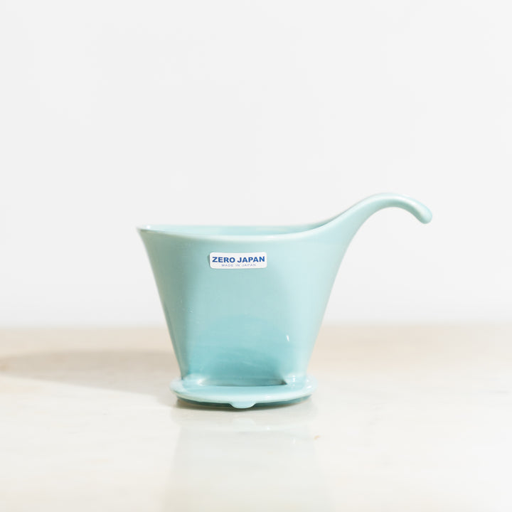 A light blue beehouse porcelain coffee dripper by Zero Japan