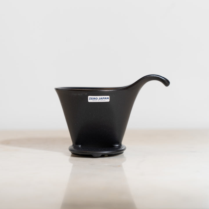 A matte black beehouse porcelain dripper by Zero Japan