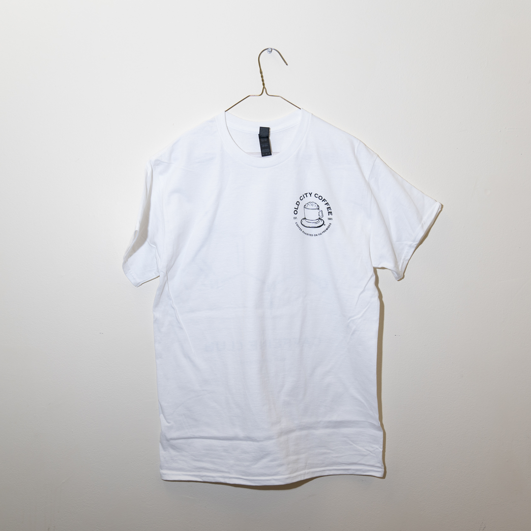 White Caffeine Club T-shirt on a hanger, front view with a small chest logo