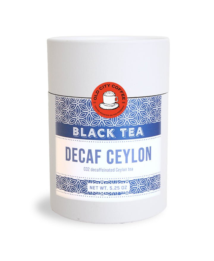 White Old City Coffee canister of decaf Ceylon black tea with a blue patterned label