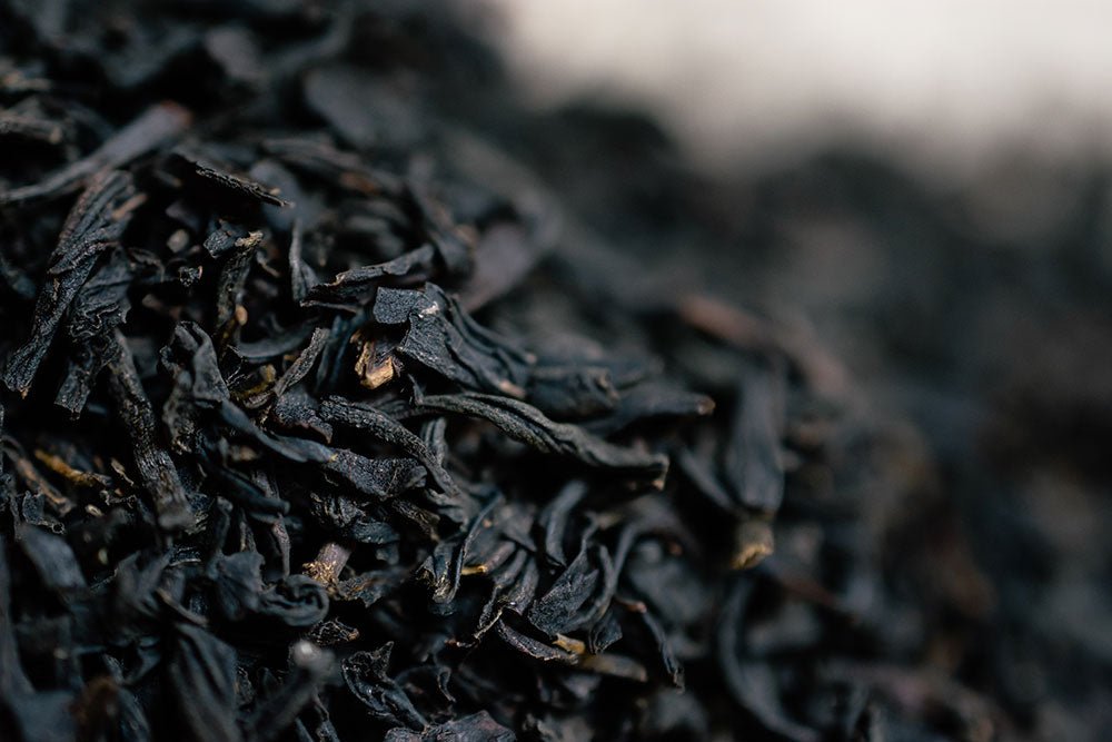 Detailed close-up of twisted Earl Grey tea leaves