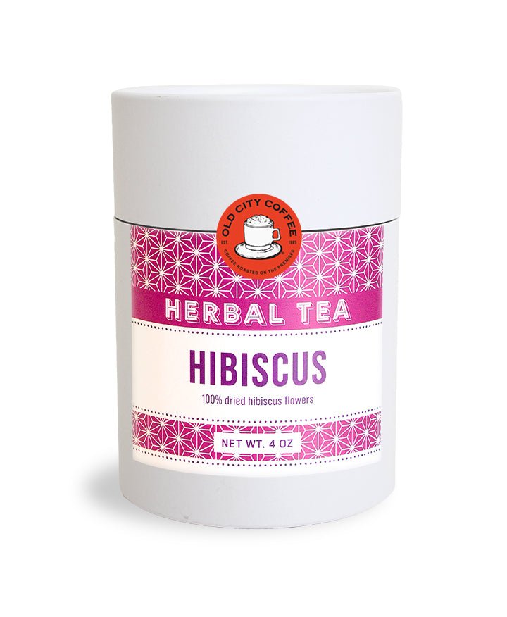 White Old City Coffee canister of hibiscus herbal tea with a pink patterned label