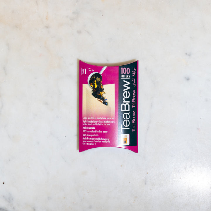 Box of TeaBrew tea filters standing on a marble counter